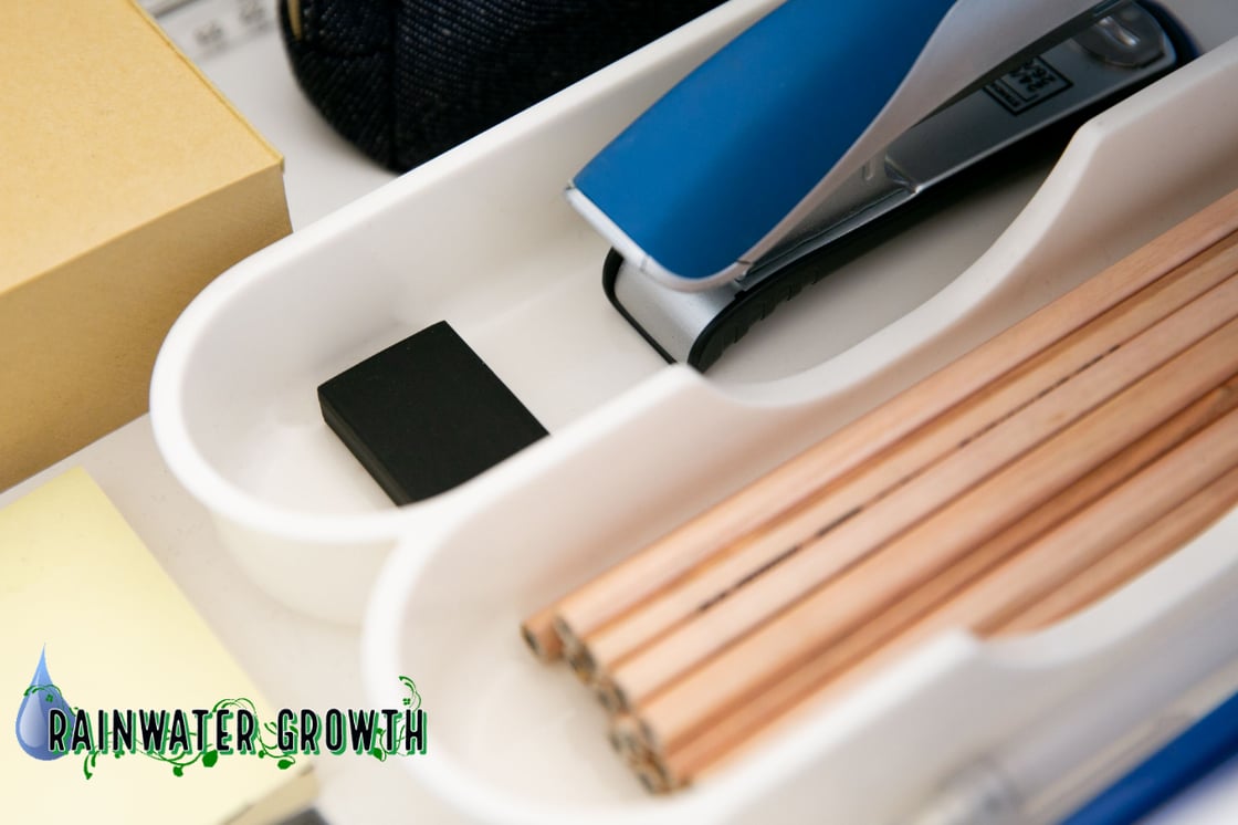 2026.07 Newsletter Hero : Supply drawer showing stapler and pencils